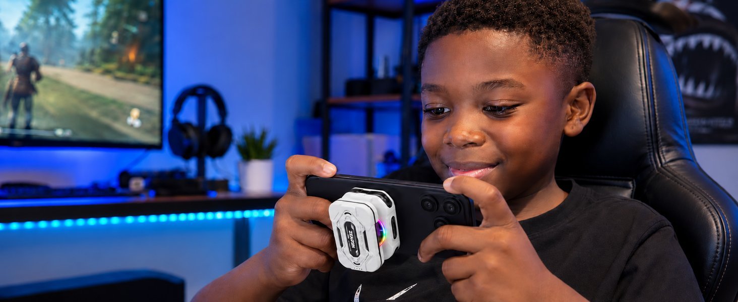 Kid gaming on a phone with a ZEAPON magnetic phone cooler